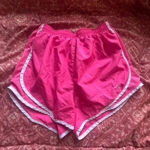 Pink Nike Athletic Shorts with White Trim